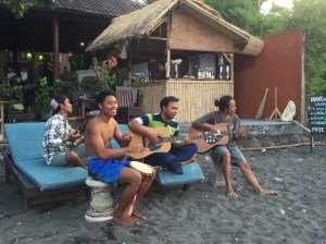 Locals playing music on the beach