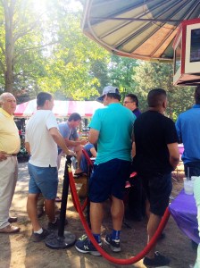 Paul surrounded by people