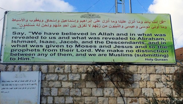 Muslim billboard by the church